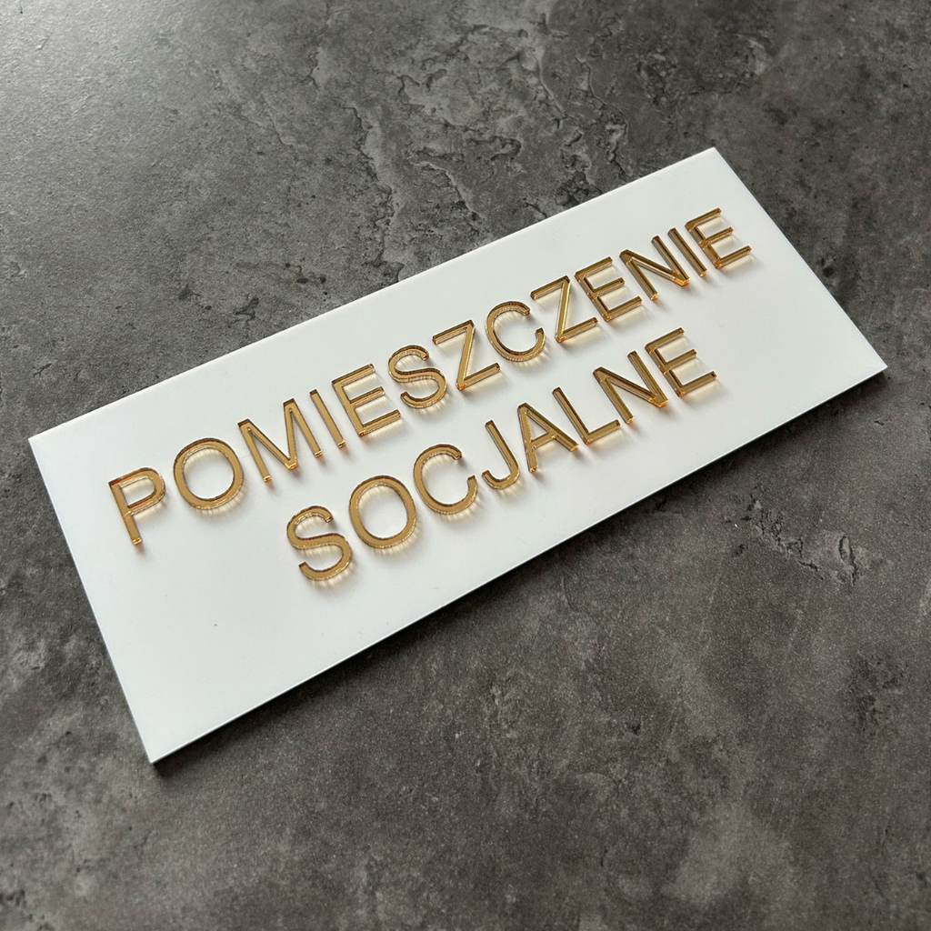 Tabliczka na drzwi POMIESZCZENIE SOCJALNE – plexi biało-złota 25x10 cm